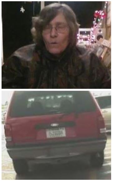 Photo of Linda Filed and back end of her red 1999 Ford Explorer. 